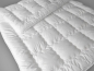 Preview: Synthetik Mono-Steppdecke COMFORT mit Randrolle, VE4